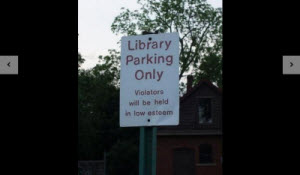 标志:图书馆停车场，违者恕不奉告